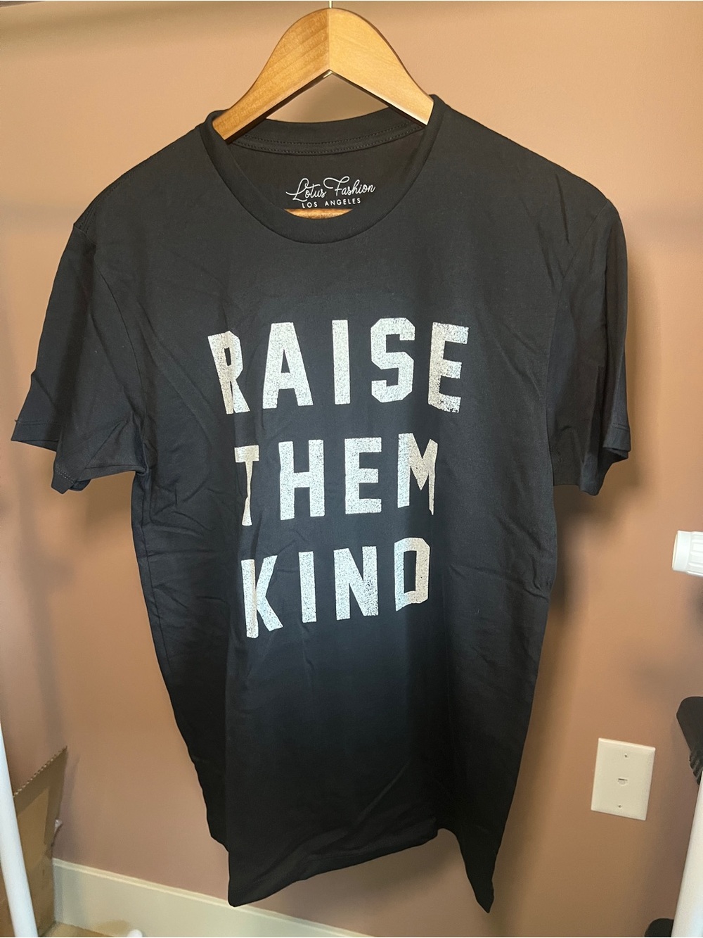 Lotus Fashion Black 'Raise Them Kind' Graphic Tee